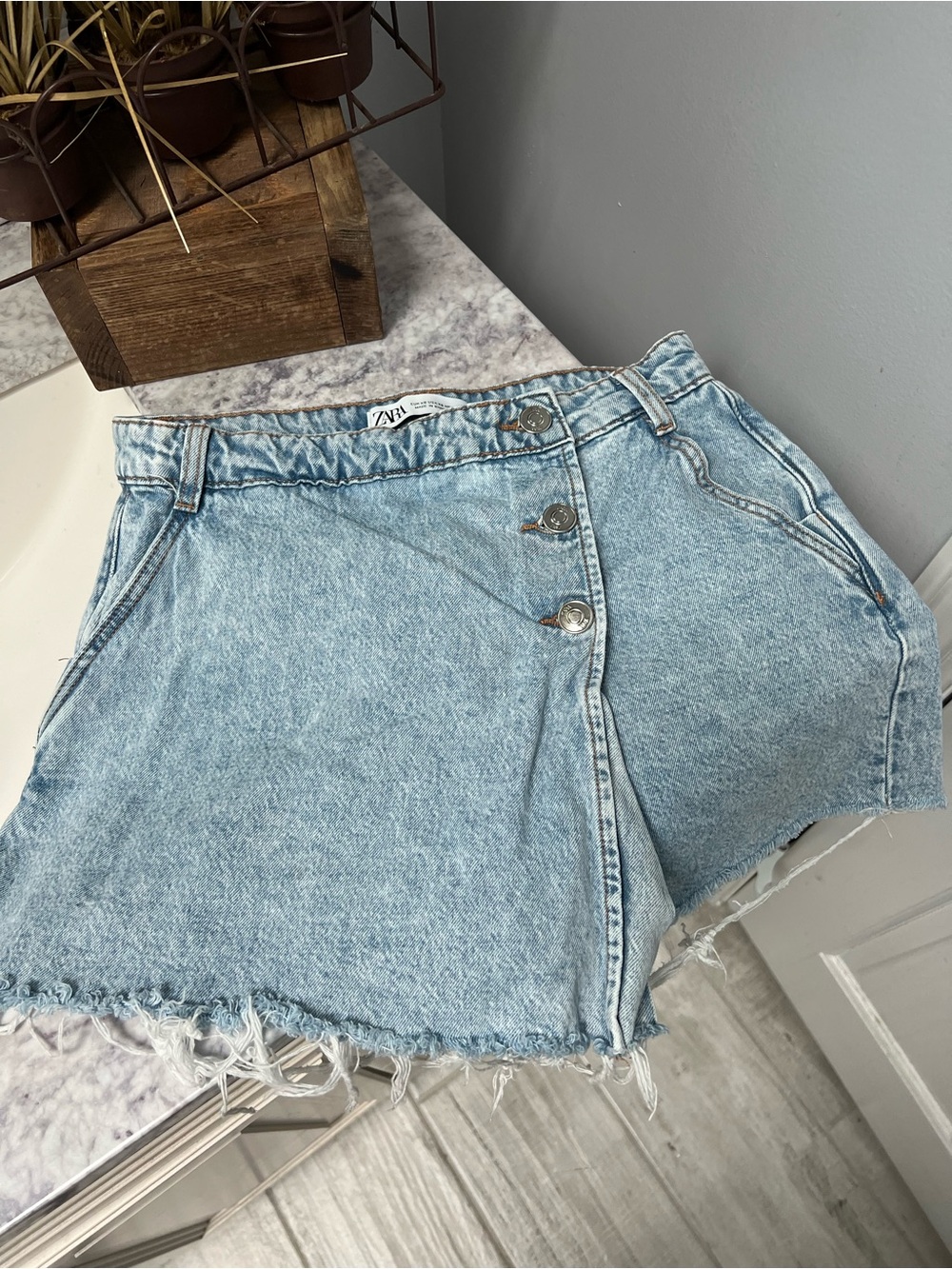 Zara Washed Light Blue Denim Button-Front Frayed Hem Skort